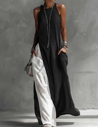 Robe longue asymétrique sans manches noire à encolure ronde, coupe ample