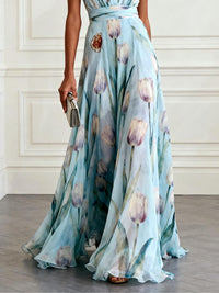 Robe longue bleue imprimée, ceinture à la taille, jupe ample et fluide jusqu’aux chevilles