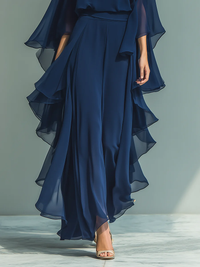 Ensemble robe bleu nuit, taille ceinturée et jupe longue à volants superposés