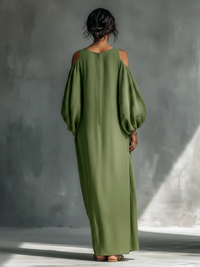 Robe longue fluide verte, épaules dénudées, dos ouvert, manches bouffantes, coupe droite
