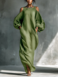 Robe longue fluide verte, épaules dénudées, manches bouffantes amples, fente latérale