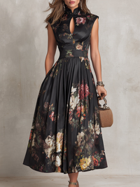 Robe midi noire évasée, sans manches, col montant, imprimé floral sur le buste