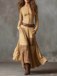 Robe longue beige à boutonnage, ceinture cuir, jupe ample avec empiècements à carreaux