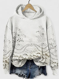 Sweat à capuche blanc en molleton, broderies florales et ourlet dentelé