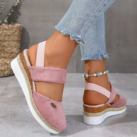 Sandales orthopédiques roses à semelle compensée en corde, bride velcro sur le dessus
