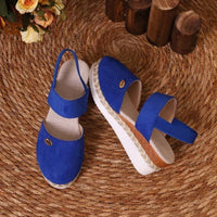 Sandales orthopédiques bleues en tissu, semelle compensée en corde, brides au-dessus du pied