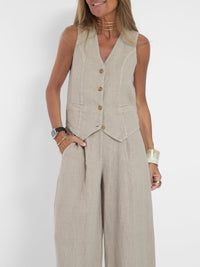 Ensemble gilet boutonné ivoire sans manches, col V, boutons, poches, pantalon ample