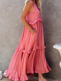 Robe longue dos nu rose fuchsia, volants étagés et bretelle fine avec dos semi-ajouré