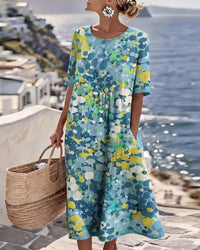 Robe midi ample fleurie bleue, manches courtes, encolure ronde