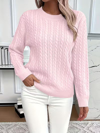 Pull doux col rond rose pâle à torsades