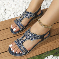 Sandales bohèmes élégantes Jenny™ bleu marine, lanières fines et fleurs en strass décoratives