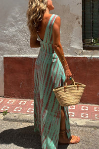 Robe d’été longue vert bleuté à motifs, dos avec échancrures, bretelles fines, fente.