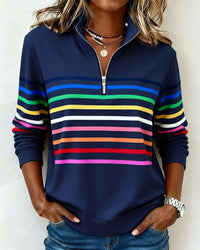 Haut sweat demi-zip bleu nuit à rayures multicolores, fermeture éclair au col.