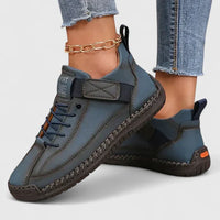 Baskets orthopédiques bleu gris à lacets, semelle crantée et sangle velcro.