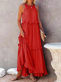 Robe longue sans manches rouge corail à volants étagés et encolure froncée, poches latérales