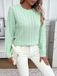 Pull doux à col rond vert menthe, maille torsadée, manches longues, bords côtelés