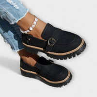 Mocassins Aurora noirs, bout fermé, semelle crantée beige et bracelet de perles
