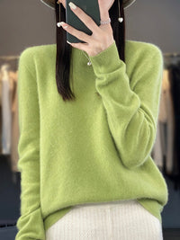 Pull tout doux vert clair, col montant, manches longues, maille douce côtelée.