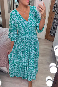 Robe longue femme turquoise à motif floral, encolure en V et manches courtes