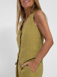 Ensemble gilet boutonné vert olive, sans manches à col V et pantalon assorti