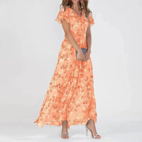 Robe longue fleurie orange à manches courtes volantées et encolure en V