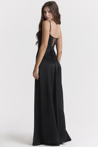 Robe cérémonie corset noire à bretelles fines, corsage structuré, jupe longue évasée.