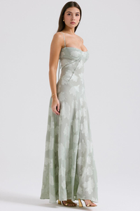 Robe longue vert émeraude clair à bretelles fines, motifs floraux sur toute la pièce