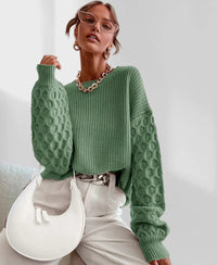 Pull de printemps vert, maille torsadée avec manches longues en relief, col rond.