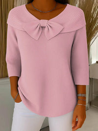 Pull en maille rose poudré avec nœud au col et manches 3/4
