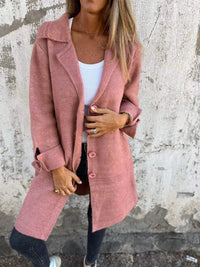 Veste blazer Stella rose à boutons, col châle, devant boutonné et manches longues.