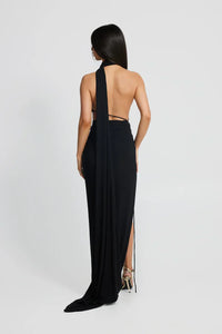 Robe longue noire dos nu avec bretelles croisées et fente sur la jambe