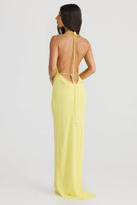 Robe longue jaune pâle vue de dos, laçage fin, décolleté bas