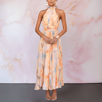 Robe longue dos nu imprimée orange et bleu, col montant, jupe évasée