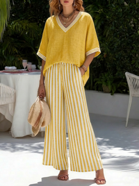 Ensemble tunique jaune moutarde et pantalon rayé à jambes larges