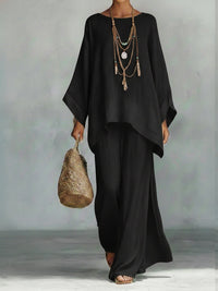 Ensemble bohème ample : tunique noire et pantalon fluide assorti.