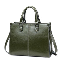 Sac cabas en cuir vert olive, anses rigides et bandoulière