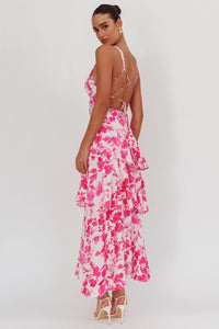 Robe midi à volants rose à motifs floraux, dos nu à lanières croisées.