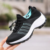 Baskets FlexiFit™ noires en tissu, détails turquoise, semelle blanche à plateforme