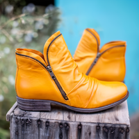 Bottines faciles à enfiler en cuir orange, tige montante et zip décoratif