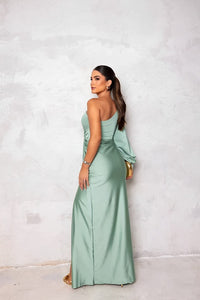 Robe longue vert menthe une épaule, drapé torsadé, fente latérale.